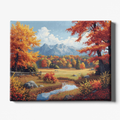 Canvas print of a scenic autumn landscape with trees, mountains, and a stream.