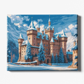 Canvas print of a snowy castle with trees against a blue sky.
