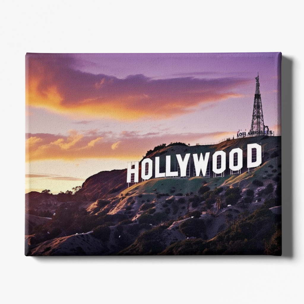 Hollywood sign with a purple and orange sky