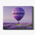 Hot air balloon with purple and pink stripes over a lavender field