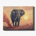Canvas print of an elephant walking in a field with a sunset in the background