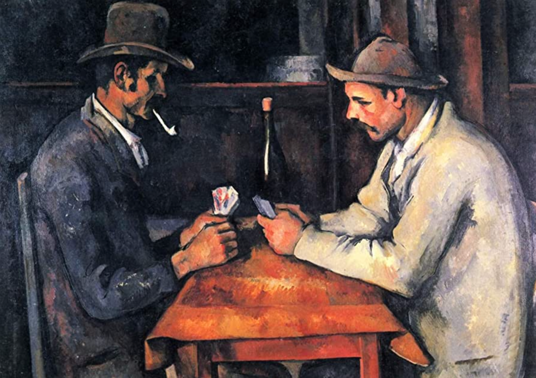 Two men playing cards at a table in a dimly lit room, with one smoking a cigarette.