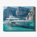 Yacht on clear blue water with rocky cliffs in the background